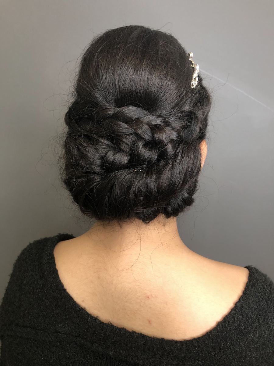 A braided occasion updo by Meraki Harrogate